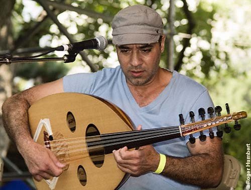 Archival photograph of Mel M’Rabet playing oud